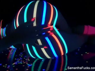 Colorful blacklight teasing with Samantha Saint